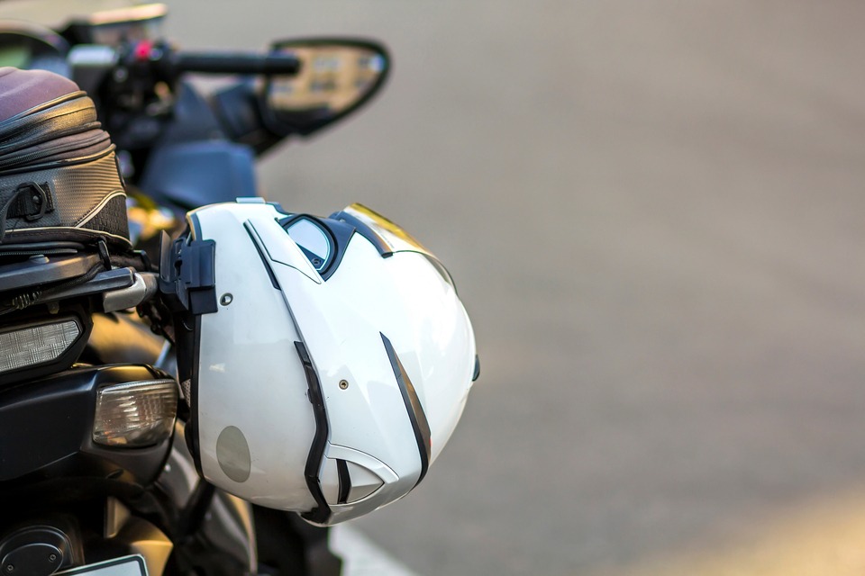 Motorcycle helmet attached to side of speed bike