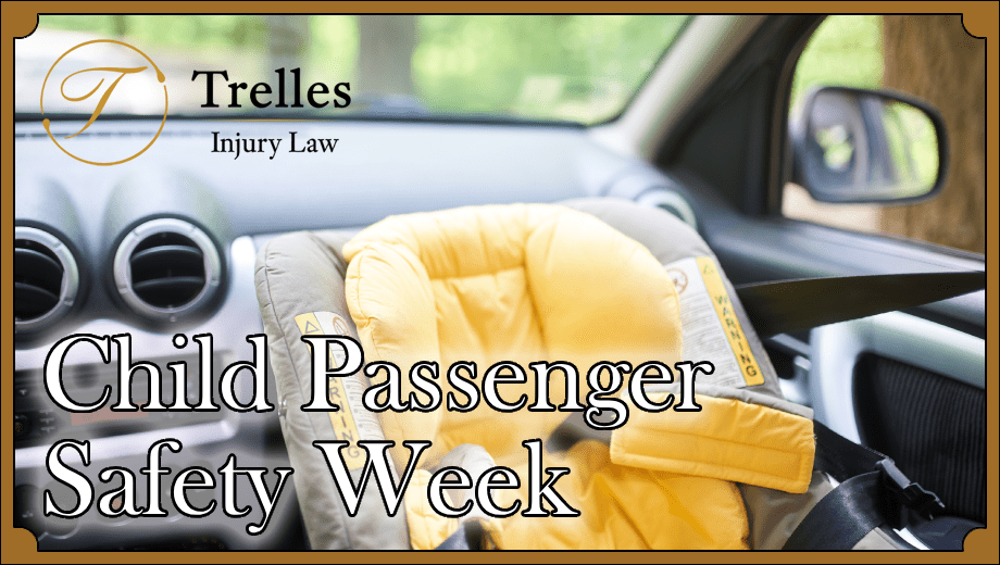 Yellow car seat in front seat with Trelles logo and blog title