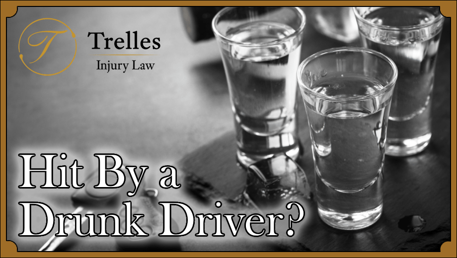Shot glasses with car keys. Trelles logo and title "hit by a drunk driver?"